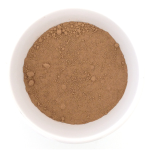 a bowl of soft brown cacao powder