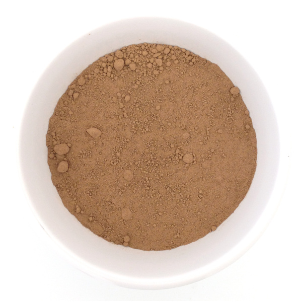 a bowl of soft brown cacao powder