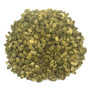 a pile of greenish pumpkin seeds