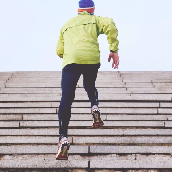 Man running up stairs