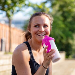 woman drinking protein shake