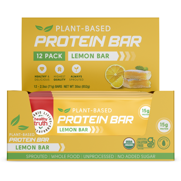 A box with a stack of lemon sprouted protein bars inside