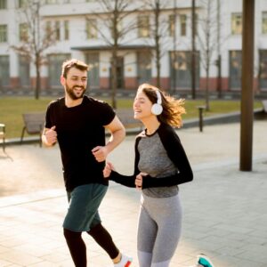 img of a couple running