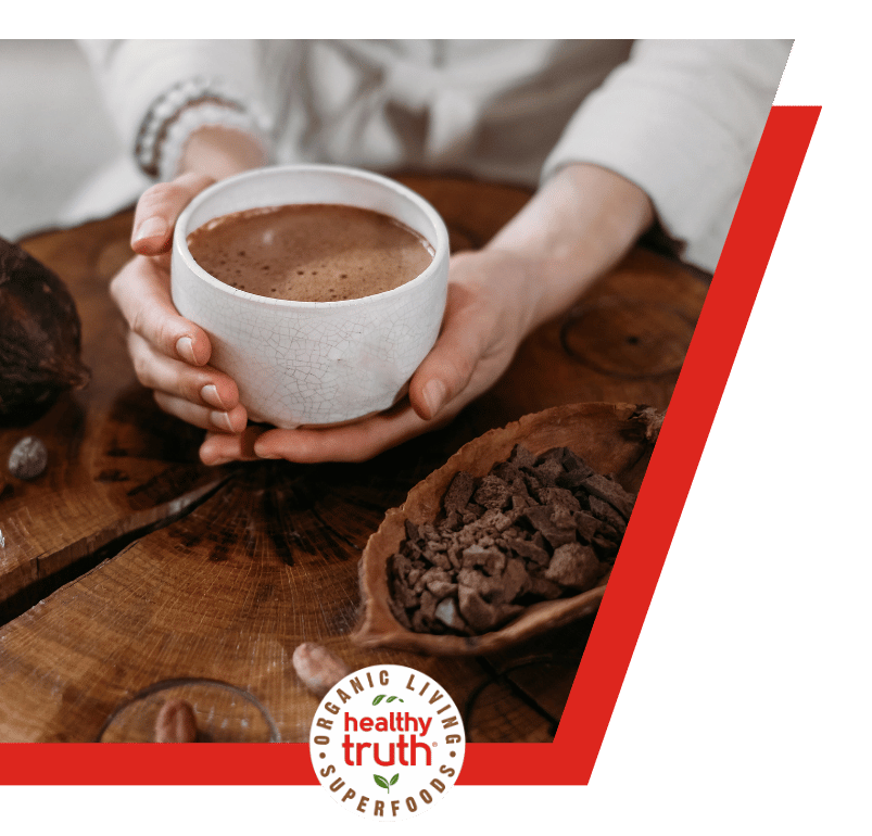 woman sits with a chocolate drink